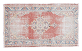 Distressed vintage Turkish Oushak rug, soft red field, sky blue medallion, 2'6
