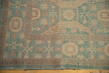 Egyptian Khotan design rug section with aqua, reddish-brown, sand, low pile, subtle abrashes.