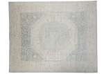 Sivas hand knotted rug, Egyptian inspired tone-on-tone design in soft blues, platinum.