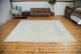 Angled view of the new Sivas carpet with subtle tone-on-tone Egyptian-inspired patterns.
