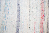 Vintage hand woven rag rug, ivory texture with pastel blue and red stripes.