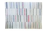 Hand-woven vintage rag rug with ivory, charcoal, and pastel striped pattern, 7'8