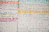 Vintage rag rug, hand woven pastel and neutral stripes, coarse linen texture with seam.
