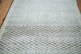 Textured distressed Oushak runner pile with faded sea foam green and charcoal checker motif.