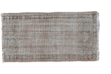 Distressed vintage Turkish Oushak rug with subtle germinating flower design in muted tones.