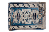 Distressed geometric tribal Oushak rug in medium blue, ivory, and navy blue, 2'6