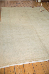 Faded vintage Oushak rug texture, light grey blue and ivory worn pile.