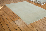 Light, airy rose and soft beige gold distressed vintage Oushak carpet.