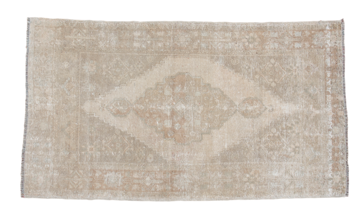Distressed vintage Oushak rug with faded center medallion, sand beige and bronze tones, 3'8" x 6'5".
