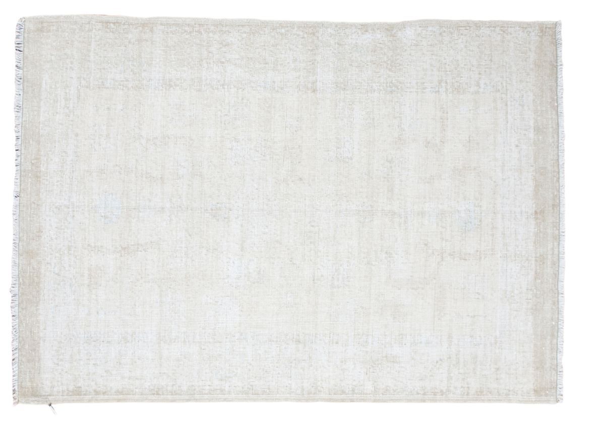 Distressed vintage Oushak rug featuring a worn, lemon ivory palette and faint pattern, 4'1" x 6'.