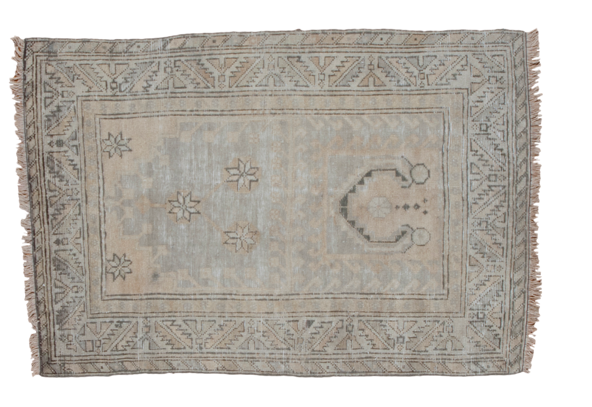 Decorative distressed Oushak rug showcasing a silver field with geometric motifs, 2'9" x 4'1".