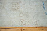 Distressed vintage Oushak rug, blanched snow white with sandy beige patterns and aqua abrash.