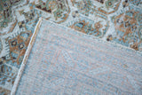 Hand-knotted foundation and distressed allover pattern of the vintage Afshar carpet.