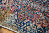 Distressed antique Senneh rug, vivid royal blue, red-rust, aqua geometric pattern, and fringe.