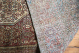 Distressed antique Senneh rug showing rich pile and contrasting overdyed flat weave texture.