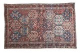 Distressed Antique Baktiary rug, panel design with pinwheel and tree motifs in red rust, blue, aqua, 4'8