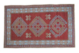 New Caucasian rug with deep red field, triple geometric shadow medallions, soft light blue border, 4'3