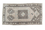 Vintage Oushak rug runner with geometric prayer design in beige, grey, and silver shades.