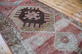 Distressed vintage Oushak runner with worn geometric texture, brick red, beige, silvery platinum.