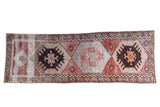 Distressed Oushak rug runner with rustic geometric patterns, brick red, platinum, and beige.