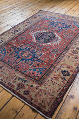 Antique Karaja rug: brick red field, brilliant gem-tone blues, geometric patterns, unusual beige border.