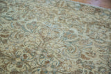 Hand-knotted vintage Sivas rug pile with a floral motif in gold, ivory, and bronze.