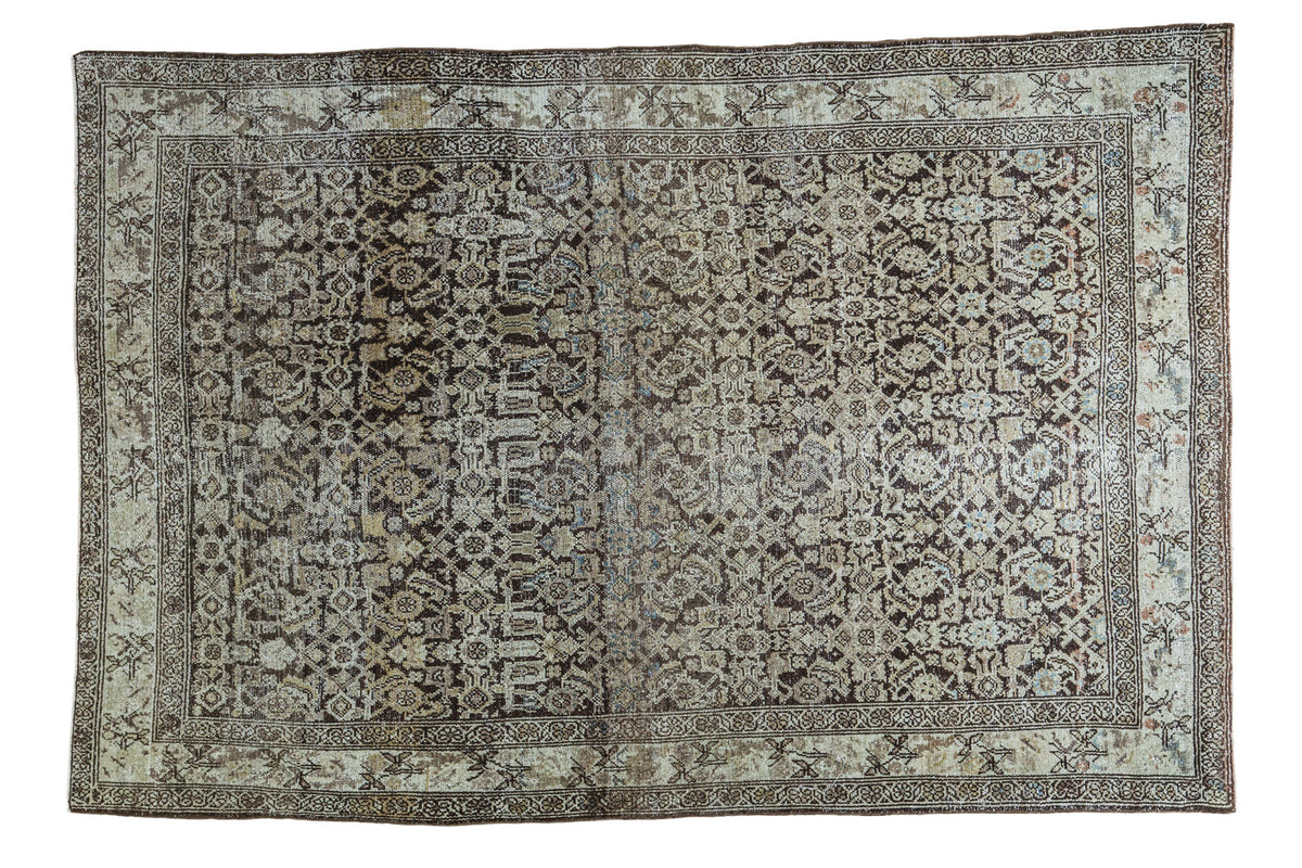 Hand-knotted vintage Malayer rug, distressed charcoal field, ivory Herati motif, 4'4" x 6'5".