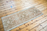 Mid-century Karaja runner's geometric ivory, coral, bronze pattern and super low pile.