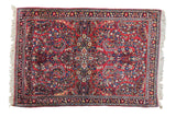 Vintage Persian Sarouk rug, intricate blossoming floral pattern on jewel red field, 3'4