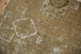 Vintage Oushak runner with alternating geometric patterns and distressed bronze-ivory pile.