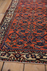 Exquisite Herati design in deep ruby red and dark blue from an antique Engelas wool rug.