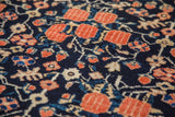 Guli Hannai floral pattern of the vintage Afshar rug: deep blue, cinnabar red, ivory.