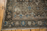 Malayer rug corner detail with bronzes, ivory, aqua teal samovar and star patterns.
