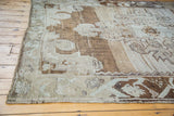 Vintage Oushak carpet's expressive abrash in bronze, silver, beige, and charcoal.
