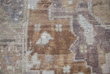 Detailed view of Oushak rug's woven pile, with bronze, silver, and charcoal abrash tones.