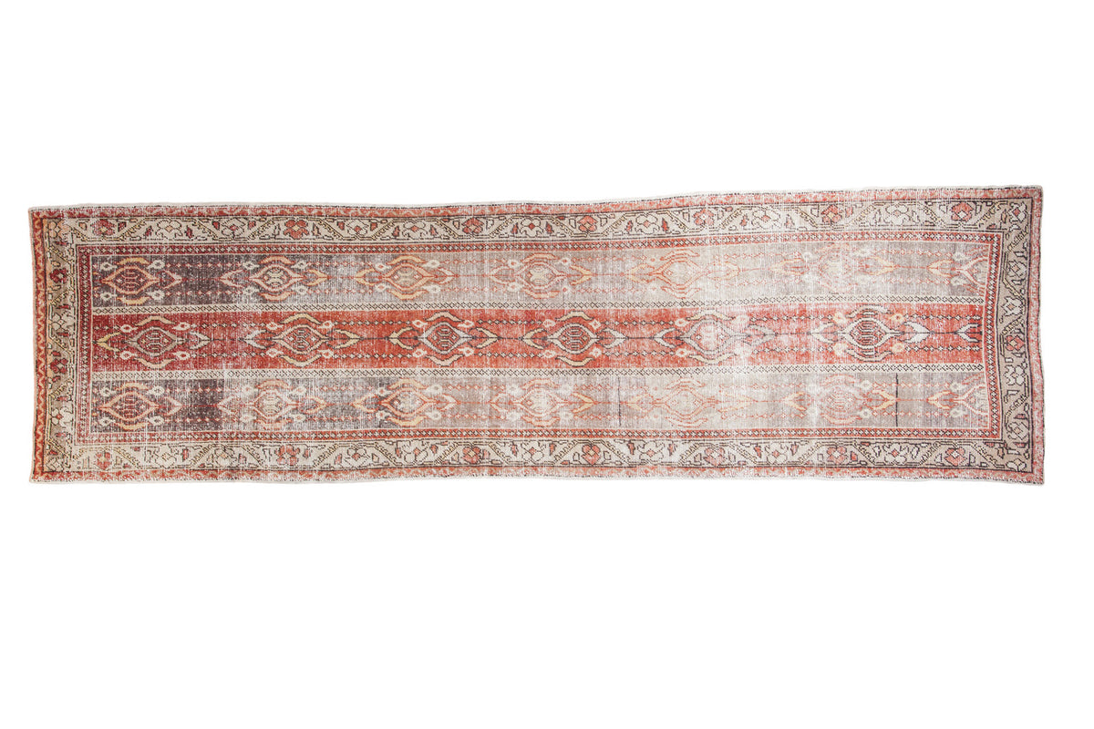 Distressed vintage Oushak rug runner, charcoal silver and faded brick red, running water motif.