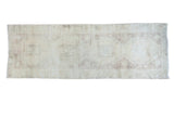 Vintage distressed Turkish Oushak rug runner, blanched multi-medallion pattern, 3'6