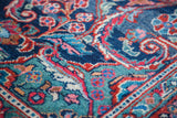 Fine vintage Mahal rug detail: indigo field, aqua, brick red scrolling leaves.