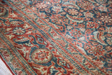 Fine pile texture of antique Tabriz rug, Herati pattern in indigo blue and rusty red.