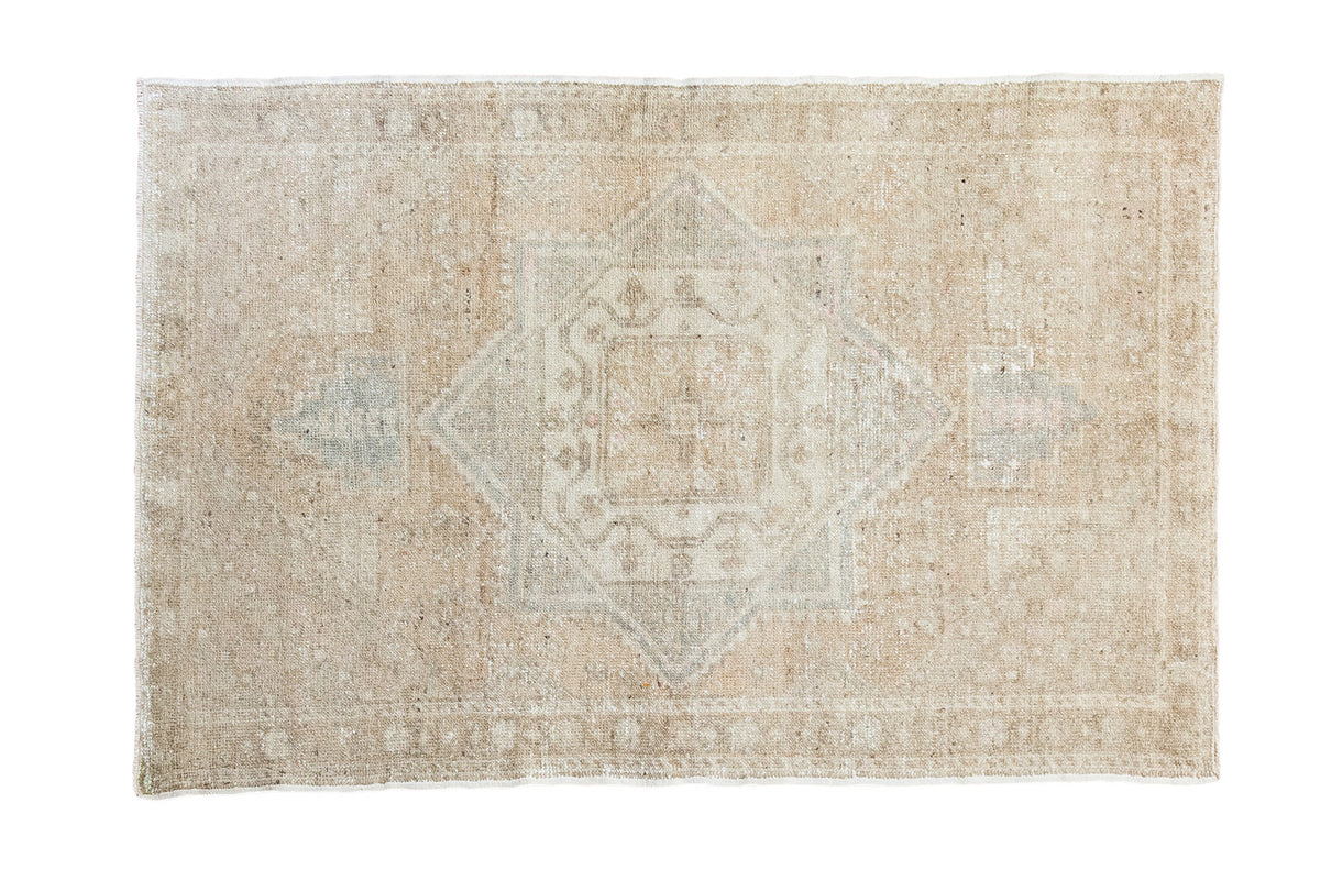 Faded coppery apricot distressed Oushak rug, 4x6, with a central square medallion.