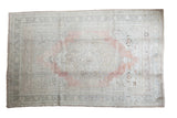 Vintage Turkish Oushak carpet, blanched coral medallion, platinum, ivory floral patterns.