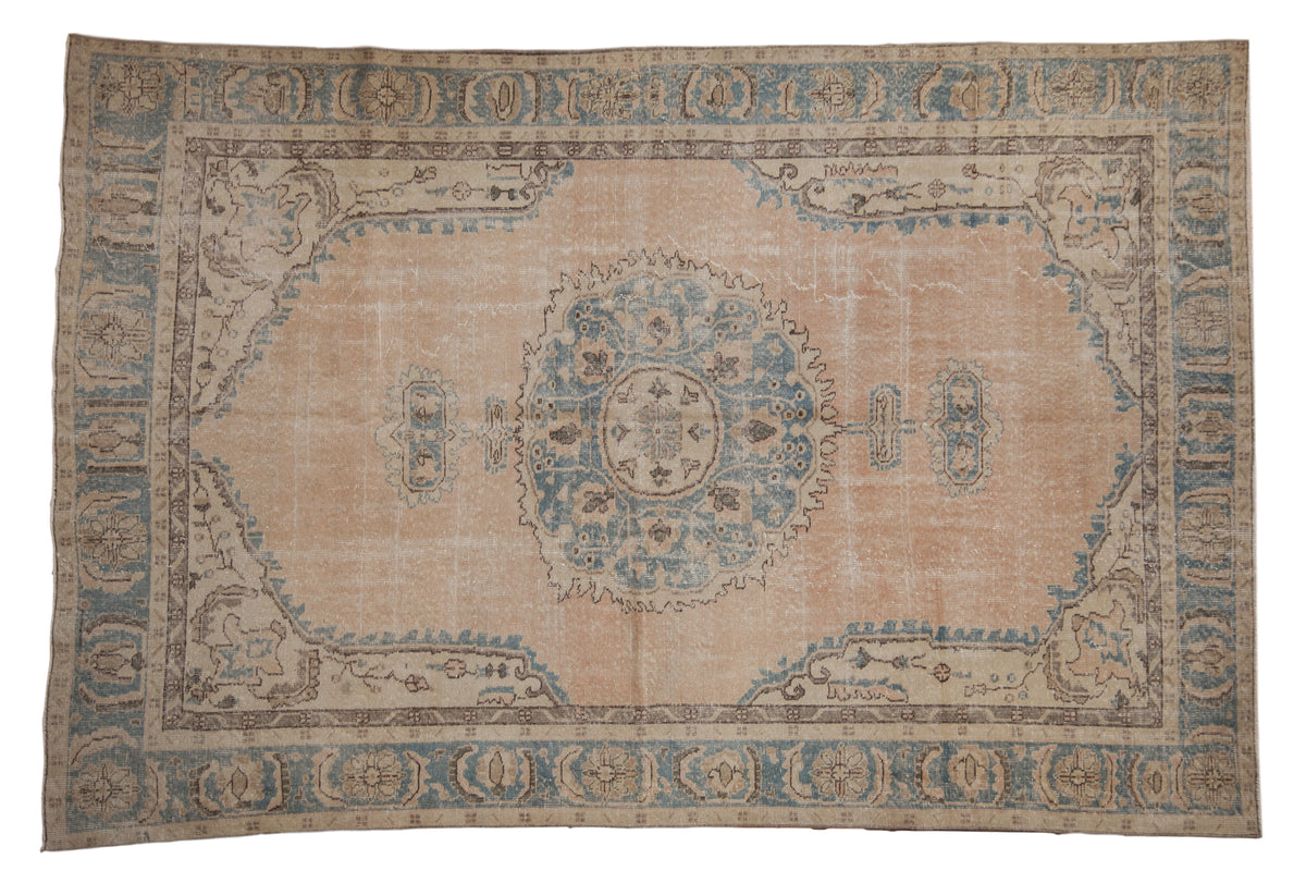 Rosy coral distressed Oushak carpet, aqua blue medallion, floral border. 6'8" x 10'1".