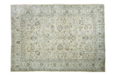Vintage Turkish Oushak rug with distressed allover floral design, softened ivory and earth tones, 7x9.5 feet.