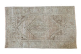 Distressed Oushak rug in soft sandy earth tones with a tone-on-tone pattern, 3'10