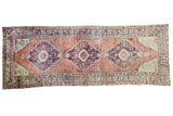 Distressed Oushak runner, sun-softened violet and grapefruit red geometric medallions, 4'4