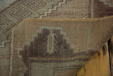 Detail of distressed Oushak runner's hand knotted reverse and secure woven edge.