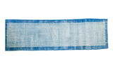 Distressed Oushak hand-knotted runner with faded light blue field and narrow deep blue border.