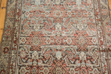Distressed vintage Malayer runner: Herati pattern, meandering leaf border, brick red, slate blue, beige.