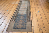 Vintage Oushak runner displaying alternating powder blue and tan geometric panels.