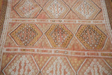 Soft peach, cream, and muted gold hand woven diamond motifs on vintage Jijim runner.